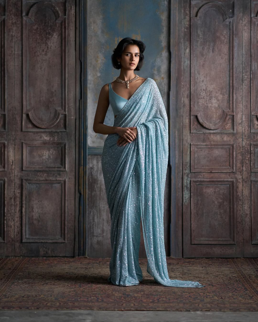 Glamorous Teal Blue Sequin Saree with Matching Blouse Piece